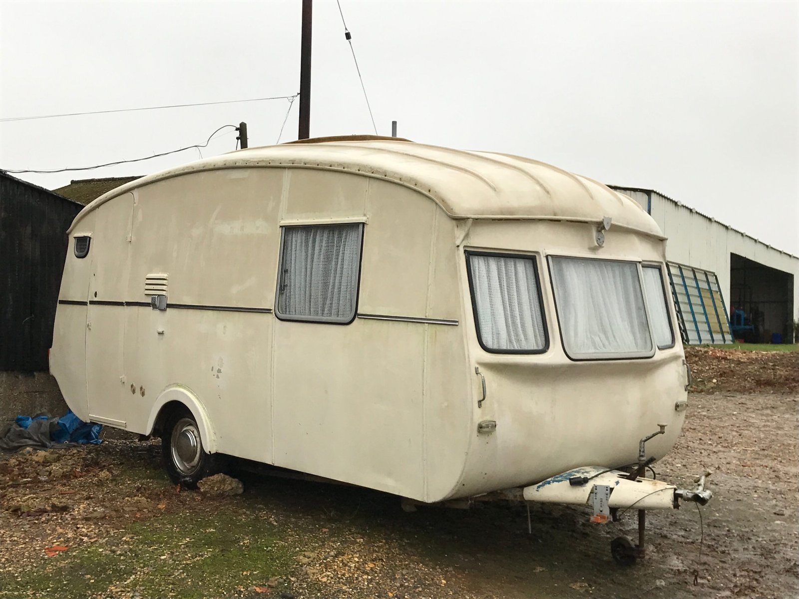 an old puku caravan in need of restoration